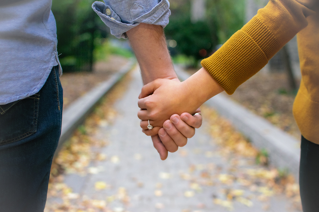 Engaged couple walking